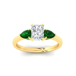 Load image into Gallery viewer, pear-diamond-cathedral-radiant-cut-engagement-ring-with-emerald-in-yellow-gold-fdenr9210rargemgrangle5-nl-yg