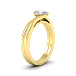Load image into Gallery viewer, pear-shaped-diamond-serenity-solitaire-wedding-set-in-yellow-gold-fdens1020peangle2-nl-yg?v=1764307629