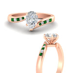 Load image into Gallery viewer, pear-shaped-diamond-swirl-channel-set-emerald-wedding-ring-in-rose-gold-FDENS4028PERGEMGRANGLE3-NL-RG_03d2d9fb-8413-4913-9d22-2e603bb4f4ff.jpg?v=1754996132