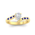 Load image into Gallery viewer, pear-shaped-diamond-swirl-channel-set-sapphire-wedding-ring-in-yellow-gold-FDENS4028PERGSABLANGLE5-NL-YG_270f24bf-2c8a-4a99-871a-8b008faff84e.jpg?v=1754996129