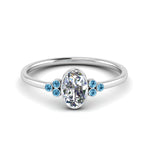 Load image into Gallery viewer, petite-bezel-set-oval-shaped-diamond-engagement-ring-with-blue-topaz-in-white-gold-FD9175OVRGICBLTO-NL-WG