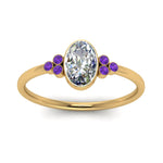 Load image into Gallery viewer, petite-bezel-set-oval-shaped-diamond-engagement-ring-with-purple-topaz-in-yellow-gold-FD9175OVRGVITOANGLE5-NL-YG