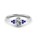 Load image into Gallery viewer, petite-bezel-set-oval-shaped-diamond-engagement-ring-with-sapphire-in-white-gold-FD9175OVRGSABL-NL-WG