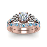 Load image into Gallery viewer, round-cut-celtic-diamond-wedding-ring-set-with-blue-topaz-in-14K-rose-gold-FDENS2255B1ROGICBLTOANGLE5-NL-RG_2f65eda2-3a9c-4843-9911-33fd5ae197a8?v=1757057011