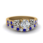 Load image into Gallery viewer, round-cut-celtic-diamond-wedding-ring-set-with-sapphire-in-14K-yellow-gold-FDENS2255B1ROGSABL-NL-YG?v=1757056939