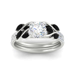 Load image into Gallery viewer, round-cut-curved-vine-black-diamond-wedding-ring-set-in-white-gold-fdens11635rogblackangle5-nl-wg_cb564d0c-7653-4d18-a2c6-d909ee2ce019.jpg?v=1764647087