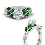 Load image into Gallery viewer, round-cut-curved-vine-emerald-wedding-ring-set-in-white-gold-fdens11635rogemgrangle3-nl-wg_1c58b924-5edb-4a15-85c6-bc84c192c115.jpg?v=1764647087