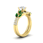 Load image into Gallery viewer, round-cut-curved-vine-emerald-wedding-ring-set-in-yellow-gold-fdens11635rogemgrangle2-nl-yg_c1415962-2a5c-42e2-a940-0d201bb1f9d9.jpg?v=1764647087