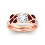 Load image into Gallery viewer, round-cut-curved-vine-ruby-wedding-ring-set-in-rose-gold-fdens11635rogrudrangle5-nl-rg.jpg?v=1764647005