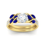 Load image into Gallery viewer, round-cut-curved-vine-sapphire-wedding-ring-set-in-yellow-gold-fdens11635rogsablangle5-nl-yg_addbe9b7-1000-4f55-a468-007e49e0f939.jpg?v=1764647087