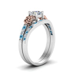 Load image into Gallery viewer, round-cut-diamond-channel-band-celtic-bridal-set-with-blue-topaz-in-14K-white-gold-FDENS2255B2ROGICBLTOANGLE2-NL-WG_7ca11740-c879-47dd-aedb-6b53b212c9b5?v=1756980511