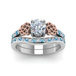 Load image into Gallery viewer, round-cut-diamond-channel-band-celtic-bridal-set-with-blue-topaz-in-950-Platinum-FDENS2255B2ROGICBLTOANGLE5-NL-WG_f0b676ae-8dfb-495c-97ea-ff80c991b206?v=1756980511