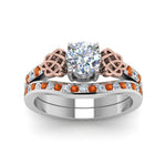 Load image into Gallery viewer, round-cut-diamond-channel-band-celtic-bridal-set-with-orange-sapphire-in-950-Platinum-FDENS2255B2ROGSAORANGLE5-NL-WG_08f15b1a-bf6b-4c45-ae31-656fea56dee9?v=1756980511