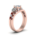 Load image into Gallery viewer, round-cut-diamond-channel-band-celtic-bridal-set-with-ruby-in-14K-rose-gold-FDENS2255B2ROGRUDRANGLE2-NL-RG_66cc691d-250f-4842-8170-c80f69d2c88a?v=1756980511