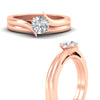 Load image into Gallery viewer, round-cut-diamond-serenity-solitaire-wedding-set-in-rose-gold-fdens1020roangle3-nl-rg?v=1764307635