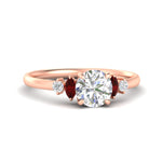 Load image into Gallery viewer, round-cut-marquise-and-round-accented-ruby-engagement-ring-in-rose-gold-fdenr11621rogrudrsleep-nl-rg_cf290b7d-5b7f-4be5-bfb6-3bae41917501.jpg?v=1766474362