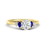 Load image into Gallery viewer, round-cut-marquise-and-round-accented-sapphire-engagement-ring-in-yellow-gold-fdenr11621rogsablsleep-nl-yg_0a3de2d8-1b9d-4775-b68e-a01d793247b9.jpg?v=1766474255
