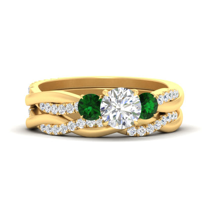round-cut-three-stone-twisted-emerald-wedding-band-in-yellow-gold-fdens3301rogemgrsleep-nl-yg.jpg