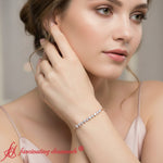 Load image into Gallery viewer, round-gold-chain-bar-bracelet-rose-gold-fdbrc10587ro-0.50ct-model.jpg?v=1774334805