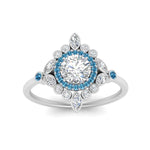 Load image into Gallery viewer, round-halo-floral-blue-topaz-engagement-ring-in-white-gold-FD9822RORGICBLTOANGLE5-NL-WG?v=1755852218