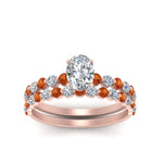Load image into Gallery viewer, shared-prong-oval-engagement-and-wedding-ring-set-with-orange-sapphire-in-FDENS3023OVGSAOR-NL-RG