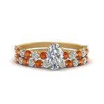 Load image into Gallery viewer, shared-prong-oval-engagement-and-wedding-ring-set-with-orange-sapphire-in-FDENS3023OVGSAOR-NL-YG