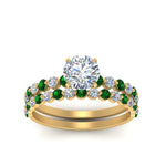 Load image into Gallery viewer, shared-prong-round-engagement-and-wedding-ring-set-with-emerald-in-FDENS3023ROGEMGR-NL-YG