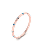 Load image into Gallery viewer, thin-space-out-stackable-diamond-band-with-blue-topaz-in-rose-gold-FDEWB9437RORGICBLTOANGLE5-NL-RG