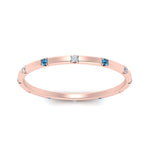 Load image into Gallery viewer, thin-space-out-stackable-diamond-band-with-blue-topaz-in-rose-gold-FDEWB9437RORGICBLTOANGLE5-NL-RG