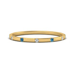 Load image into Gallery viewer, thin-space-out-stackable-diamond-band-with-blue-topaz-in-yellow-gold-FDEWB9437RORGICBLTO-NL-YG