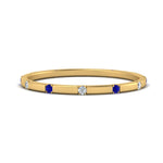Load image into Gallery viewer, thin-space-out-stackable-diamond-band-with-sapphire-in-yellow-gold-FDEWB9437RORGSABL-NL-YG