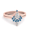 Load image into Gallery viewer, tiara-pear-bezel-blue-topaz-wedding-ring-set-in-rose-gold-FD1046PEGICBLTO-NL-RG?v=1761911422
