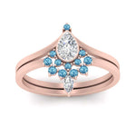 Load image into Gallery viewer, tiara-pear-bezel-blue-topaz-wedding-ring-set-in-rose-gold-FD1046PEGICBLTOANGLE5-NL-RG_c4a939c0-47a5-46ff-8ff0-b6ef7191f6b1?v=1761911441