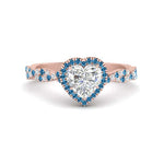 Load image into Gallery viewer, twisted-heart-shaped-blue-topaz-halo-engagement-ring-in-rose-gold-FD9126HTRGICBLTO-NL-RG_481959bd-9ec5-40c6-8e25-f888f3a9f0e4?v=1757924911
