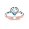 Load image into Gallery viewer, twisted-heart-shaped-blue-topaz-halo-engagement-ring-in-rose-gold-FD9126HTRGICBLTOANGLE5-NL-RG_fe46e9ce-3c03-4dae-8649-c9ba1f0376a4?v=1757924911