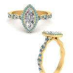 Load image into Gallery viewer, twisted-marquise-blue-topaz-halo-engagement-ring-in-yellow-gold-FD9126MQRGICBLTOANGEL3-NL-YG_141d3f9e-2a9a-4ba4-9f6c-b6c12b82320b?v=1757924922