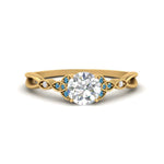 Load image into Gallery viewer, vintage-irish-knot-round-diamond-engagement-ring-with-blue-topaz-in-yellow-gold-FD124181RORGICBLTO-NL-YG.jpg