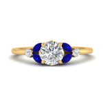 Load image into Gallery viewer, vintage-marquise-and-round-engagement-round-ring-with-sapphire-in-yellow-gold-FDENR635RORGSABL-NL-YG_4b0e9440-7005-4ca0-8048-888eff05cbda.jpg?v=1765948149