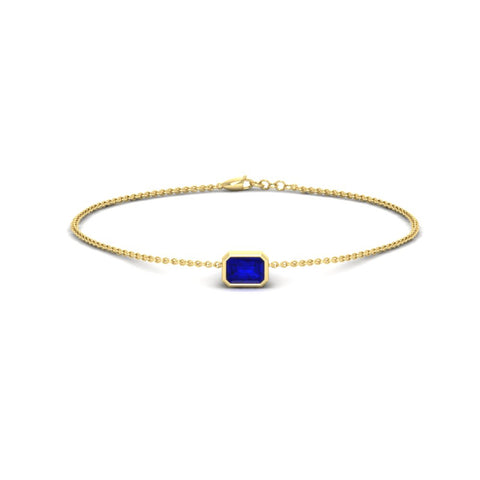 0.25-carat-emerald-cut-sapphire-bezel-set-chain-bracelet-in-yellow-gold-FD-BRC11133EMGSABLANGLE2-0.25CT-NL-YG