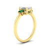 Load image into Gallery viewer, 0.25-ct-emerald-cut-three-stone-emerald-engagement-ring-in-yellow-gold-fdenr9299emgemgrangle2-0.25ct-nl-yg.jpg