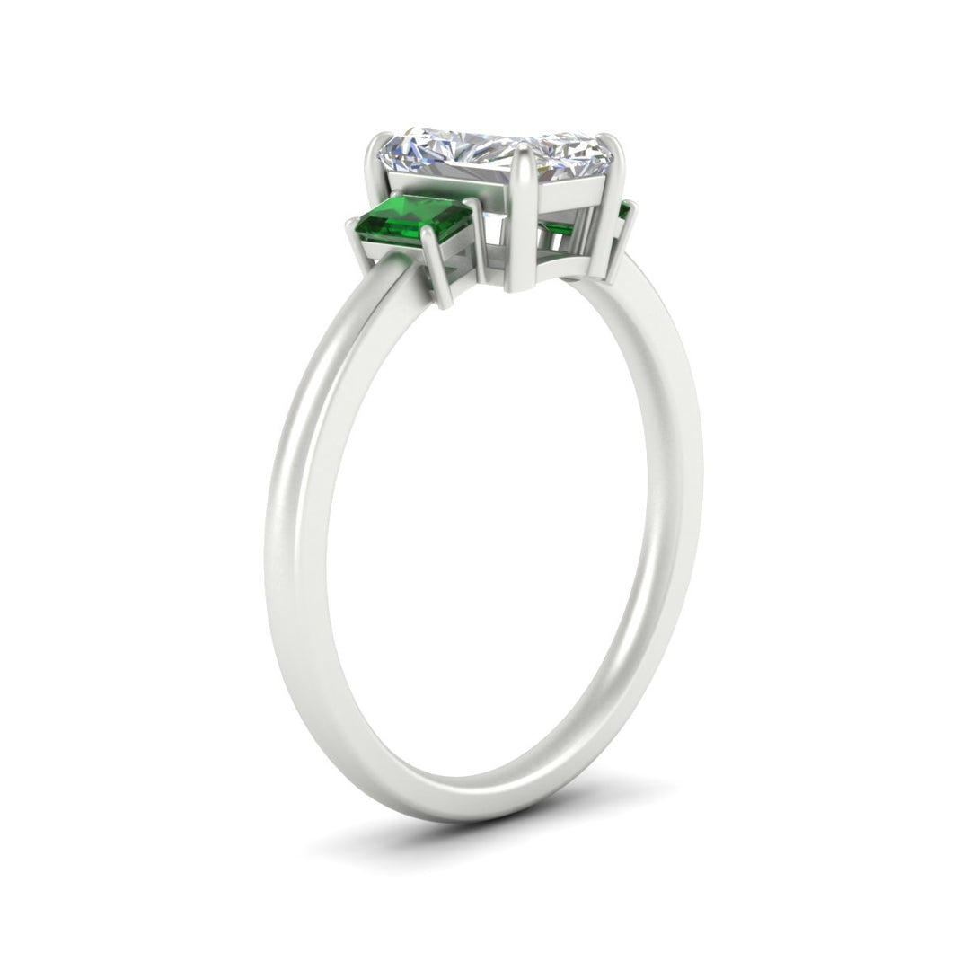 0.25-ct-radiant-cut-three-stone-emerald-engagement-ring-in-white-gold-fdenr9299ragemgrangle2-0.25ct-nl-wg.jpg
