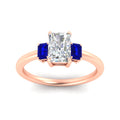 Thumbnail 23 - 0.25-ct-radiant-cut-three-stone-sapphire-engagement-ring-in-rose-gold-fdenr9299ragsablangle5-0.25ct-nl-rg.jpg