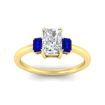 Load image into Gallery viewer, 0.25-ct-radiant-cut-three-stone-sapphire-engagement-ring-in-yellow-gold-fdenr9299ragsablangle5-0.25ct-nl-yg.jpg