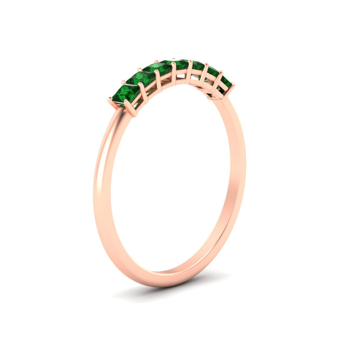 https://cdn.fascinatingdiamonds.com/FDWB179/0.50-carat-Princess-cut-7-stone-emerald-wedding-band-in-rose-gold-fdwb179prgemgrangle2-0.50ct-nl-rg.jpg