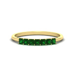 Load image into Gallery viewer, https://cdn.fascinatingdiamonds.com/FDWB179/0.50-carat-Princess-cut-7-stone-emerald-wedding-band-in-yellow-gold-fdwb179prgemgrsleep-0.50ct-nl-yg.jpg