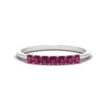 Load image into Gallery viewer, https://cdn.fascinatingdiamonds.com/FDWB179/0.50-carat-Princess-cut-7-stone-pink-sapphire-wedding-band-in-white-gold-fdwb179prgsadrpisleep-0.50ct-nl-wg.jpg
