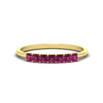 Load image into Gallery viewer, https://cdn.fascinatingdiamonds.com/FDWB179/0.50-carat-Princess-cut-7-stone-pink-sapphire-wedding-band-in-yellow-gold-fdwb179prgsadrpisleep-0.50ct-nl-yg.jpg