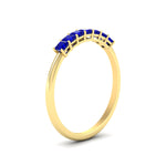Load image into Gallery viewer, https://cdn.fascinatingdiamonds.com/FDWB179/0.50-carat-Princess-cut-7-stone-sapphire-wedding-band-in-yellow-gold-fdwb179prgsablangle2-0.50ct-nl-yg.jpg
