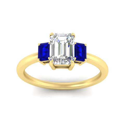 0.50-ct-emerald-cut-three-stone-sapphire-engagement-ring-in-yellow-gold-fdenr9299emgsablangle5-0.50ct-nl-yg.jpg
