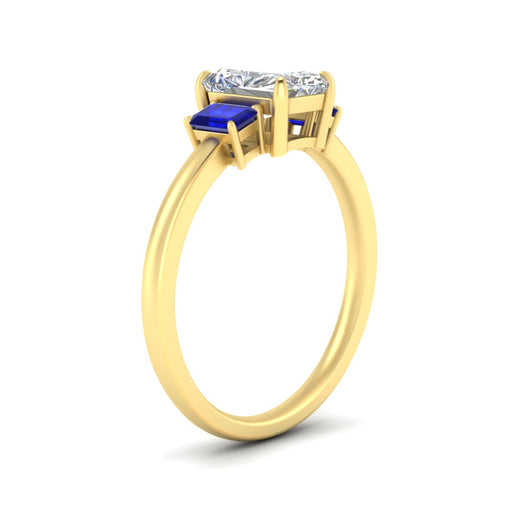 0.50-ct-radiant-cut-three-stone-sapphire-engagement-ring-in-yellow-gold-fdenr9299ragsablangle2-0.50ct-nl-yg.jpg